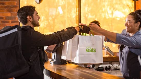 handing over uber eats