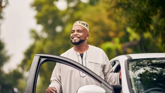 Man standing outside car