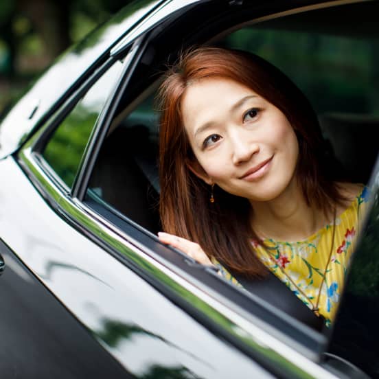 lady looking out of car window