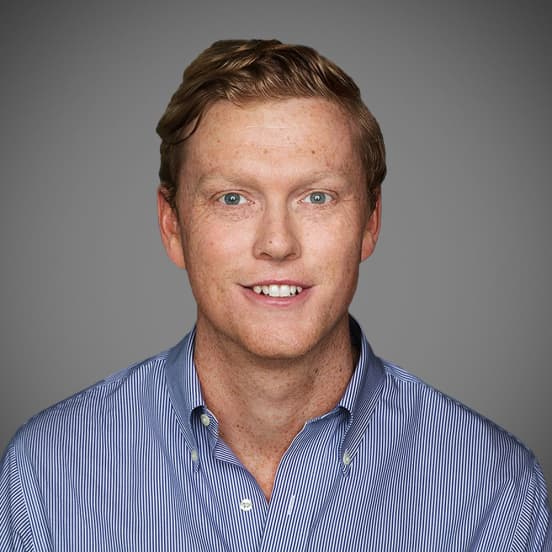 Portrait photograph of Andrew Macdonald