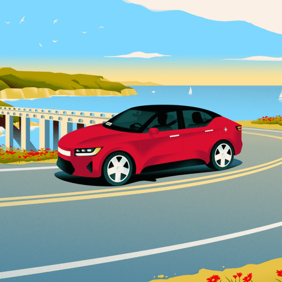 Red car driving coastal California