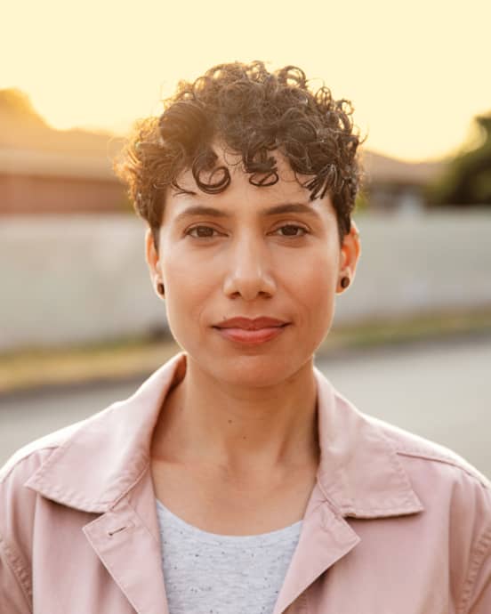 Woman driver portrait at sunset