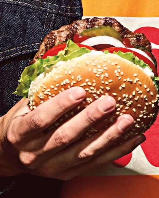Burger king burger in hand