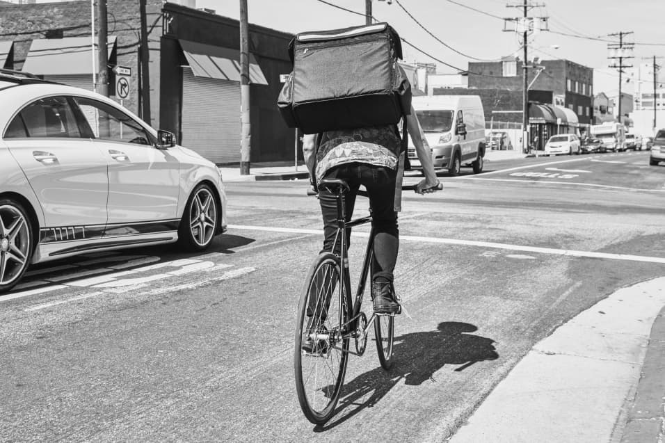 uber eats bicycle using car